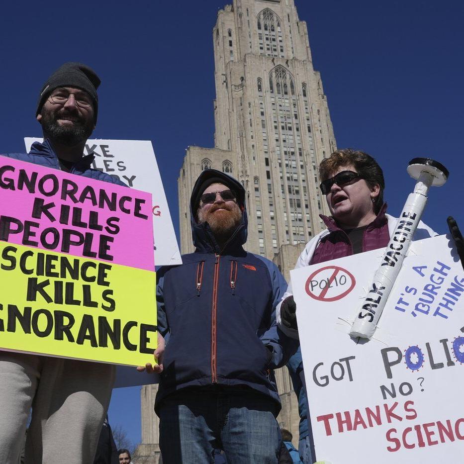 Out of the lab and into the streets, researchers and doctors rally for science against Trump cuts